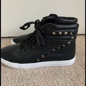 Black studded high top sneakers
